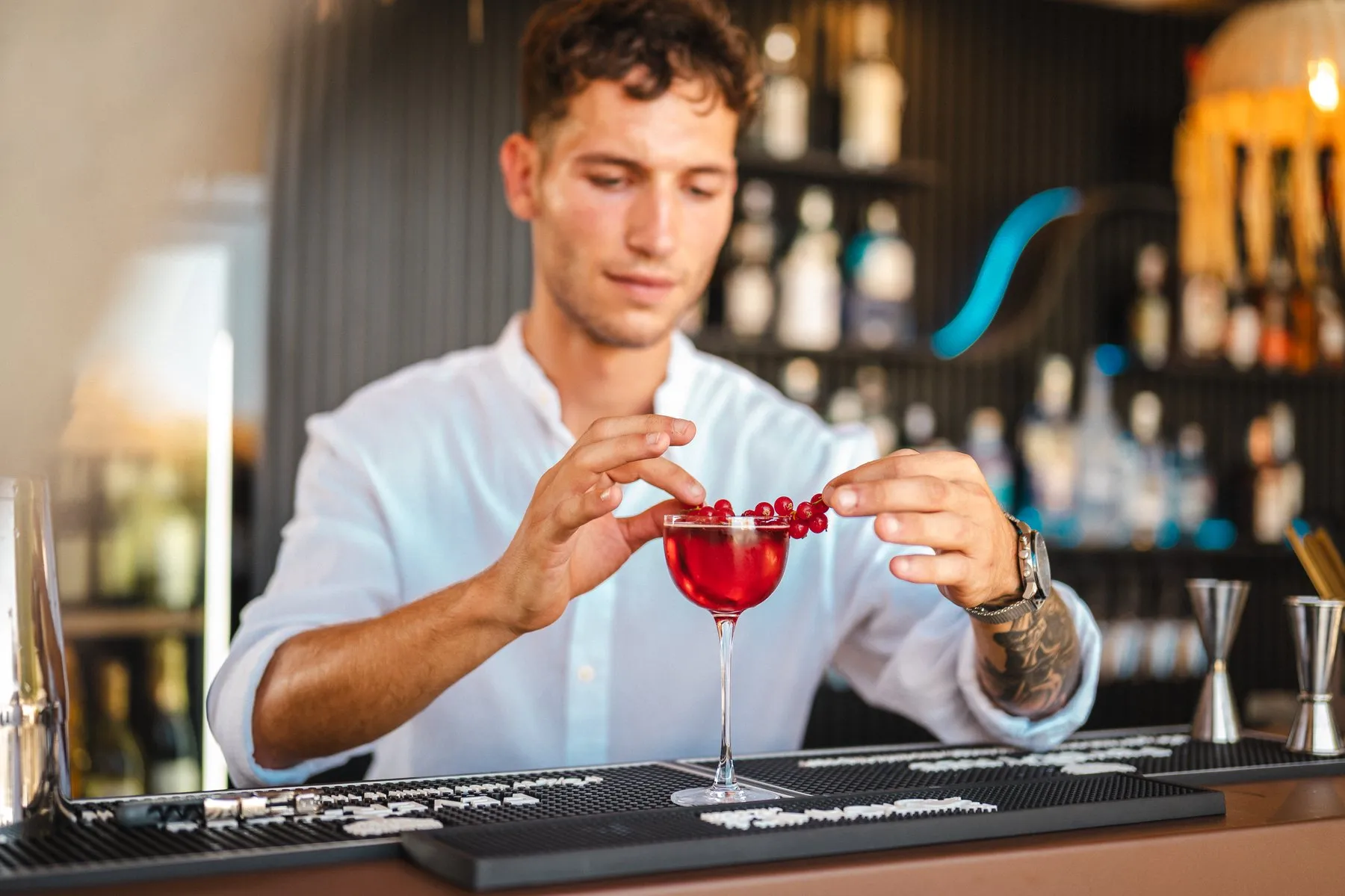 Garnishing a Lumina cocktail