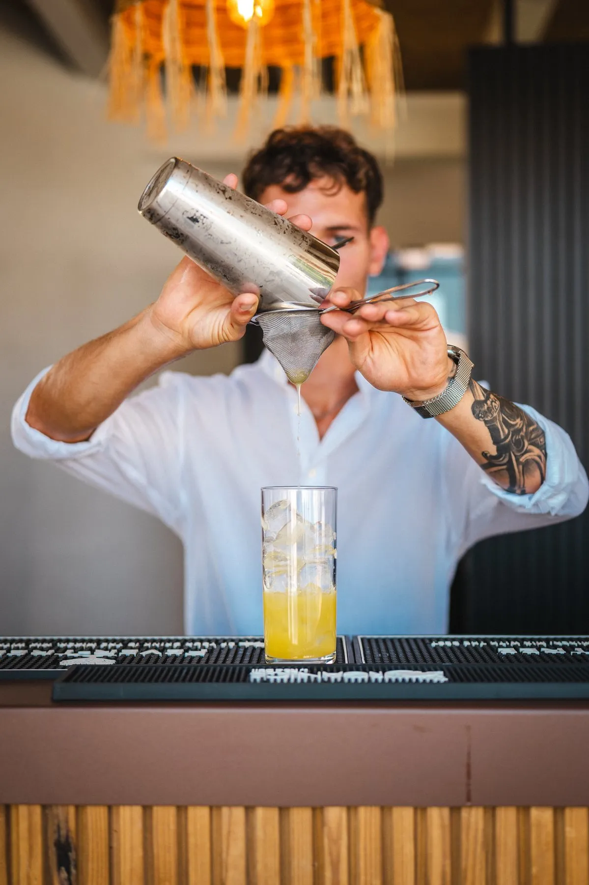 Lumina bartender crafting a cocktail